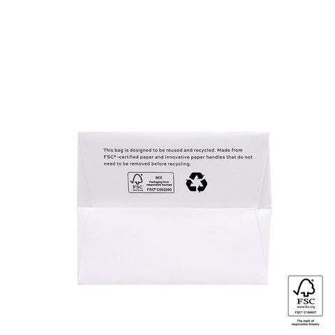 Image of White bag with recycling information and FSC certification label on a white background